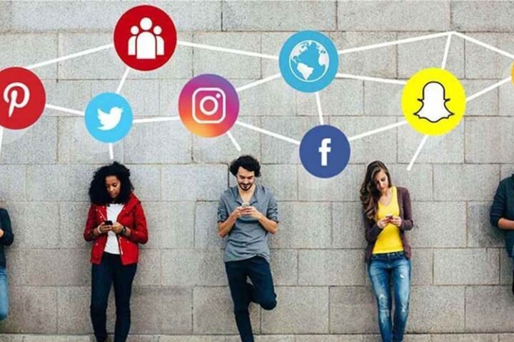 Young people using social media platforms like Instagram, TikTok, and Snapchat, reflecting a surge in digital engagement.