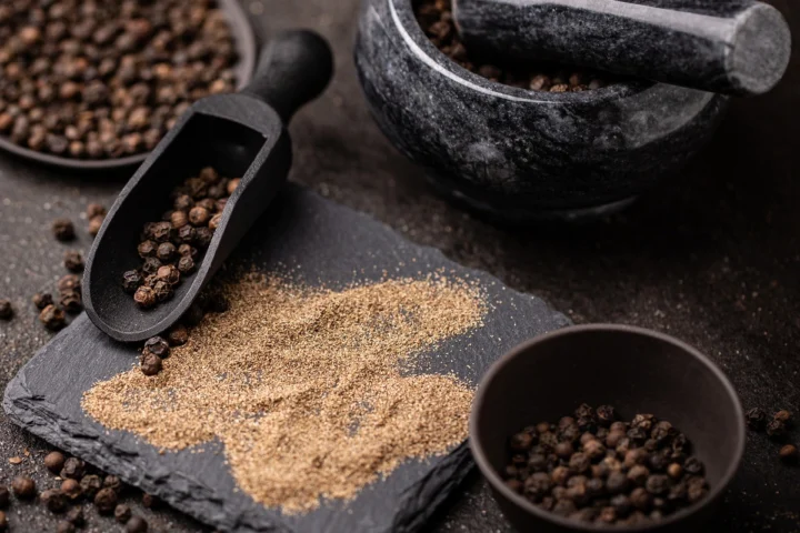 Adding black pepper to winter meals for enhanced flavor and health benefits.