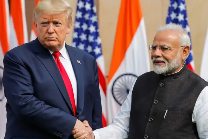 Donald Trump and Narendra Modi in a meeting, discussing the repatriation of 18,000 illegal immigrants.