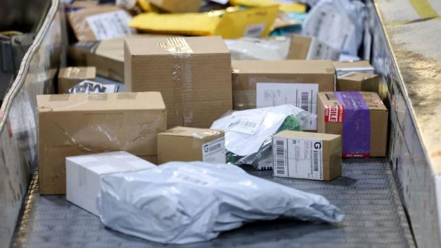 U.S. suspends parcel deliveries from China & Hong Kong, impacting businesses and consumers.