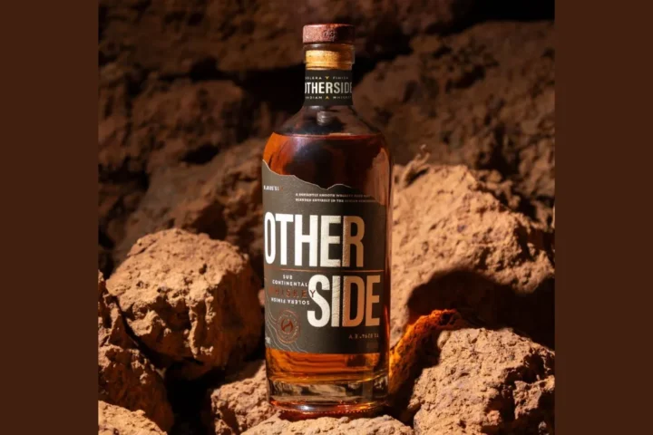 Bottle of Otherside Whiskey by Third Eye Distillery, a premium Indian whiskey priced at ₹3,250. Let me know if you'd like variations!