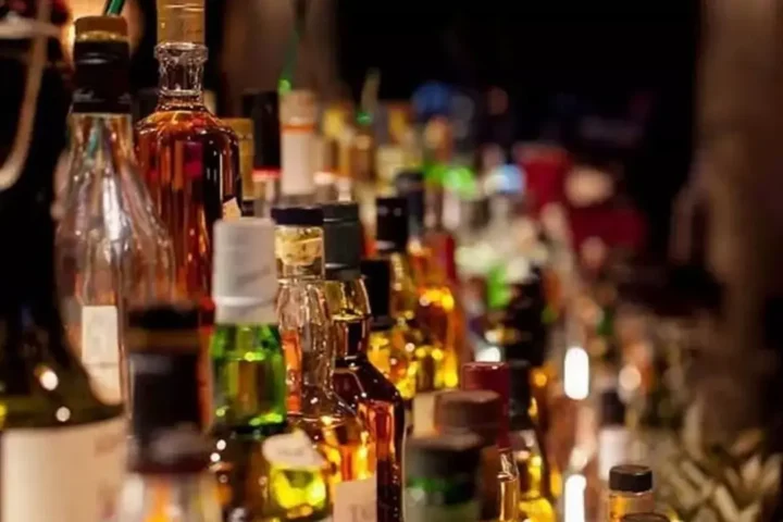 Liquor shops near religious sites in Uttarakhand shut down under new policy, impacting the local alcohol industry and economy.