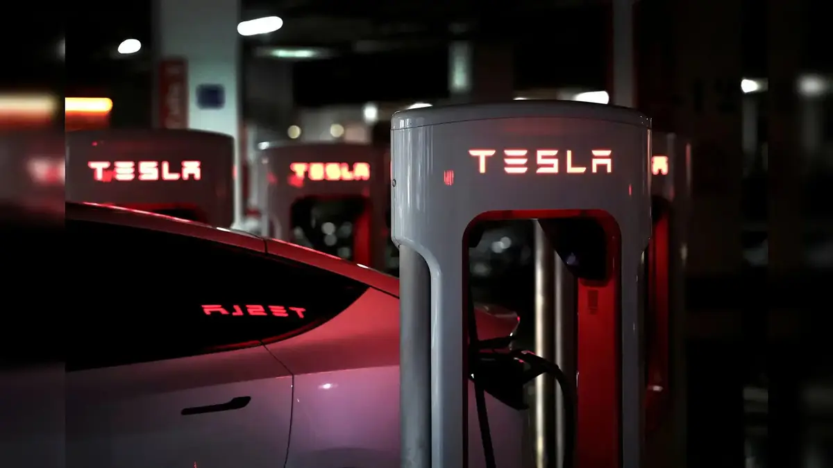 Union Minister confirms Tesla not interested in EV manufacturing in India, plans limited to showrooms.