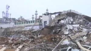 Delhi Police and RAF deployed during anti-encroachment demolition near Faiz-e-Elahi Mosque at Turkman Gate following violent clashes
