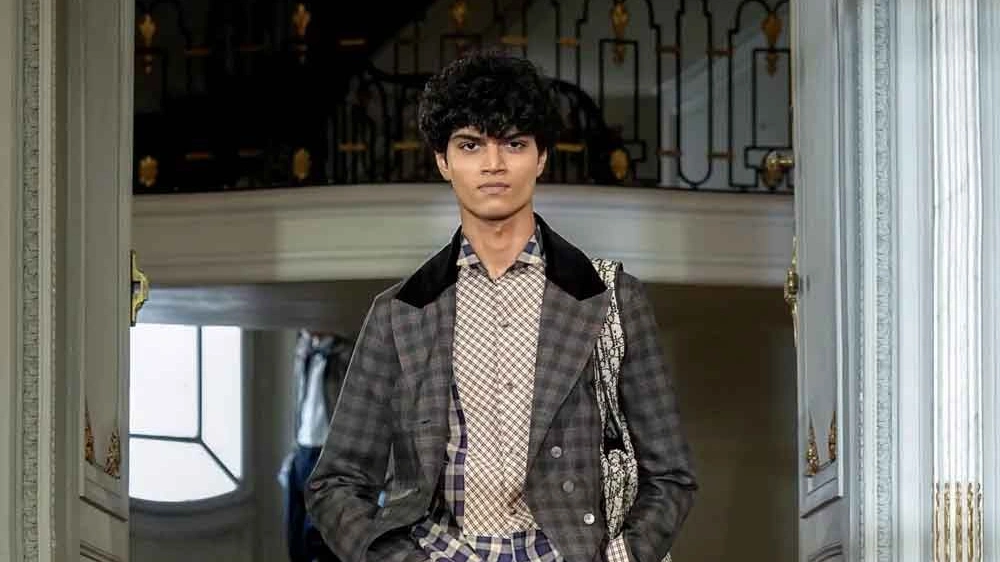 Indian model and mechanical engineering student Yug Sanjay Devalia walking the runway during the Dior Menswear Spring Summer 2027 fashion show in Paris.