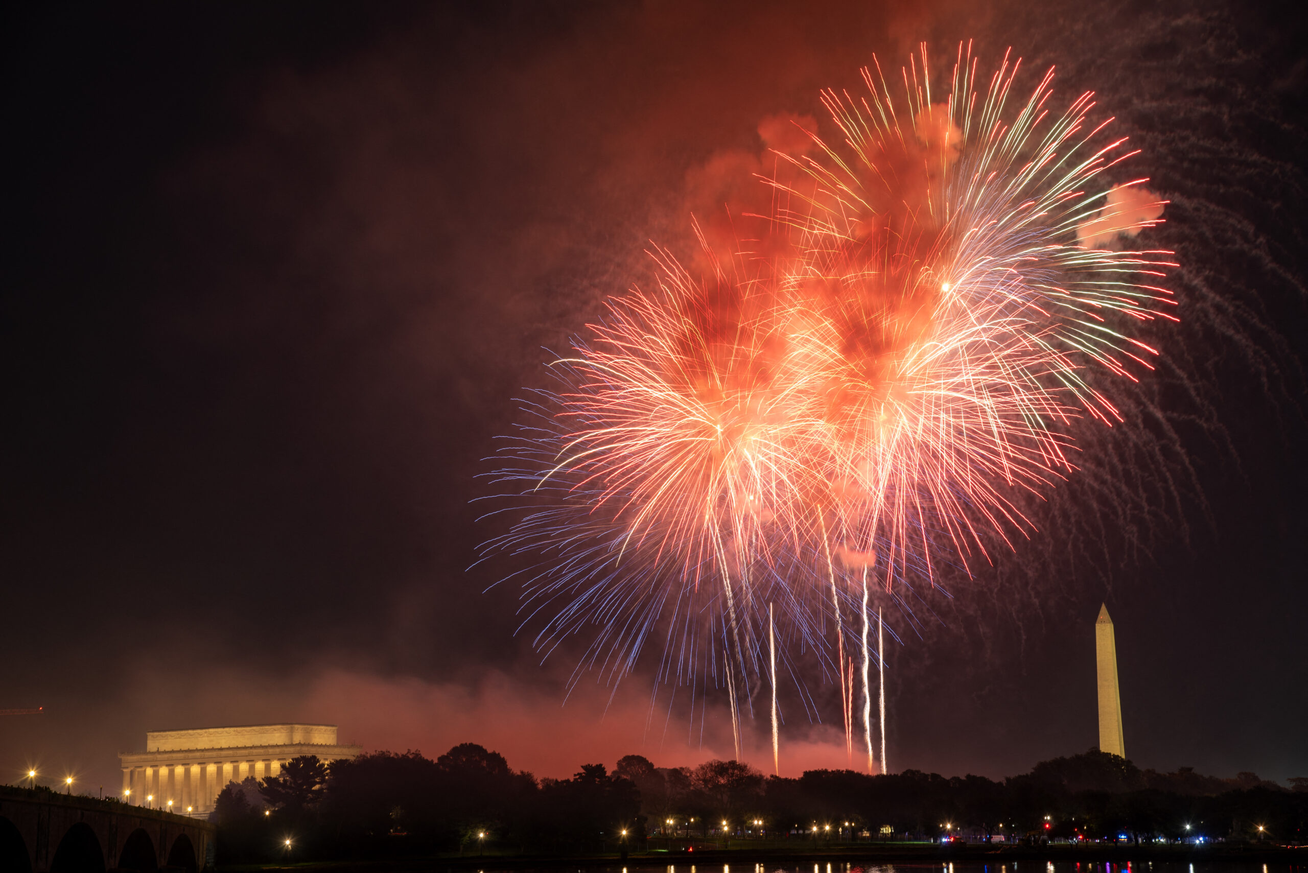 Washington skyline covered in smoke after Fourth of July fireworks as air pollution levels surged during Freedom 250 celebrations.